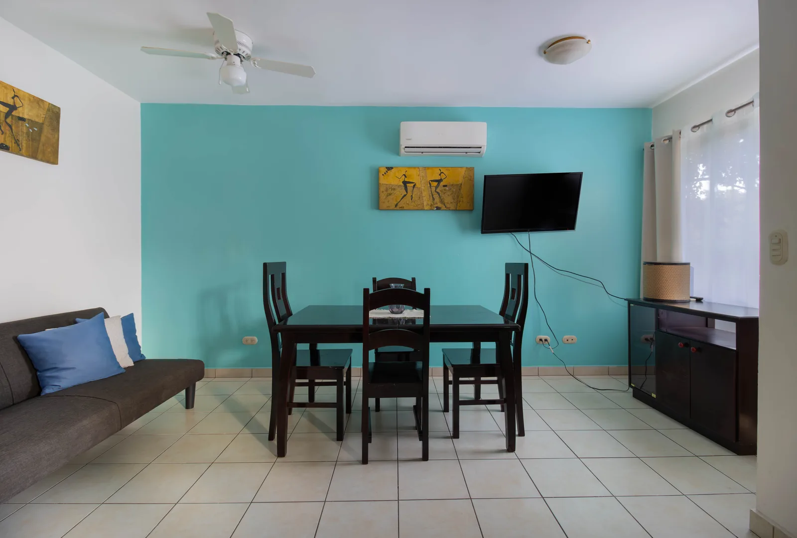 Living and dining area at Aquamarine 11