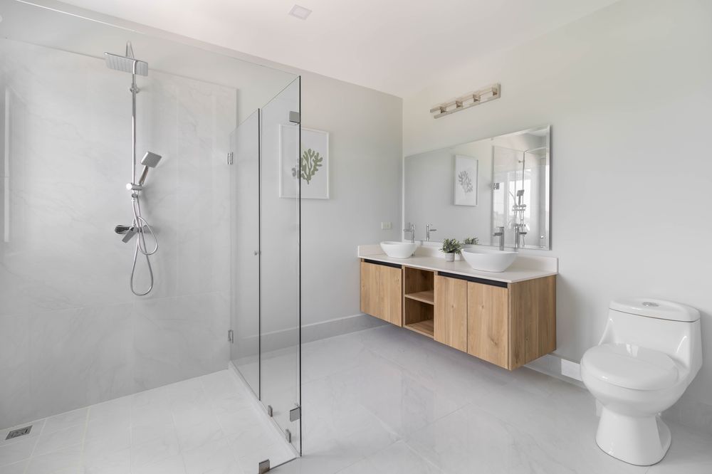 Spa-style bathroom with glass shower and floating vanity